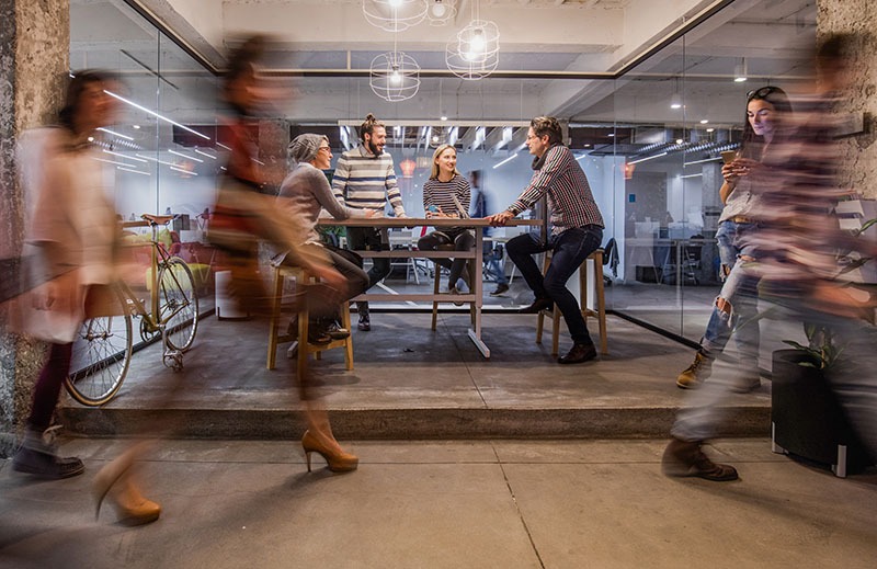 business meeting at a busy corporate office