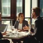 The sales and marketing teams work together in a meeting.