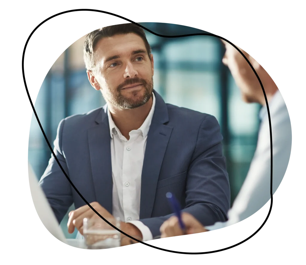 Professional discussing sales recruitment strategies.