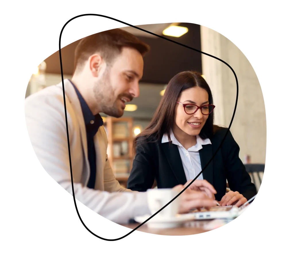 Sales and marketing recruiters collaborating on candidate selection.